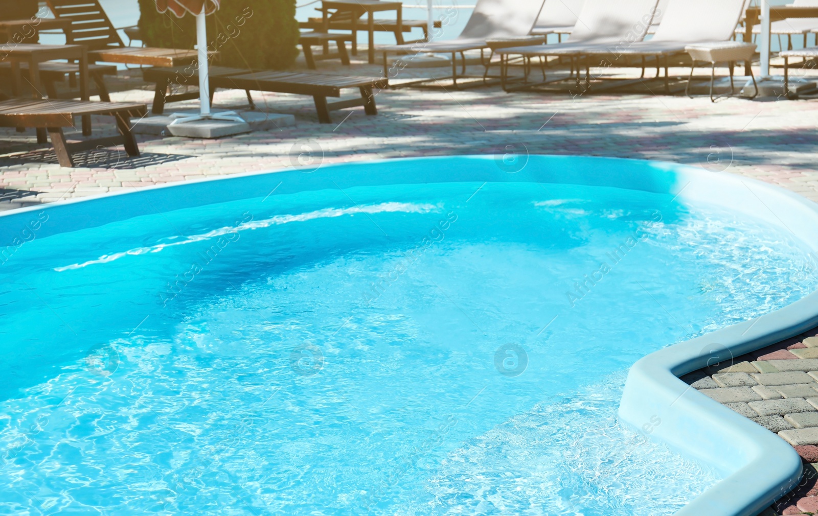 Photo of Swimming pool with clean blue water outdoors