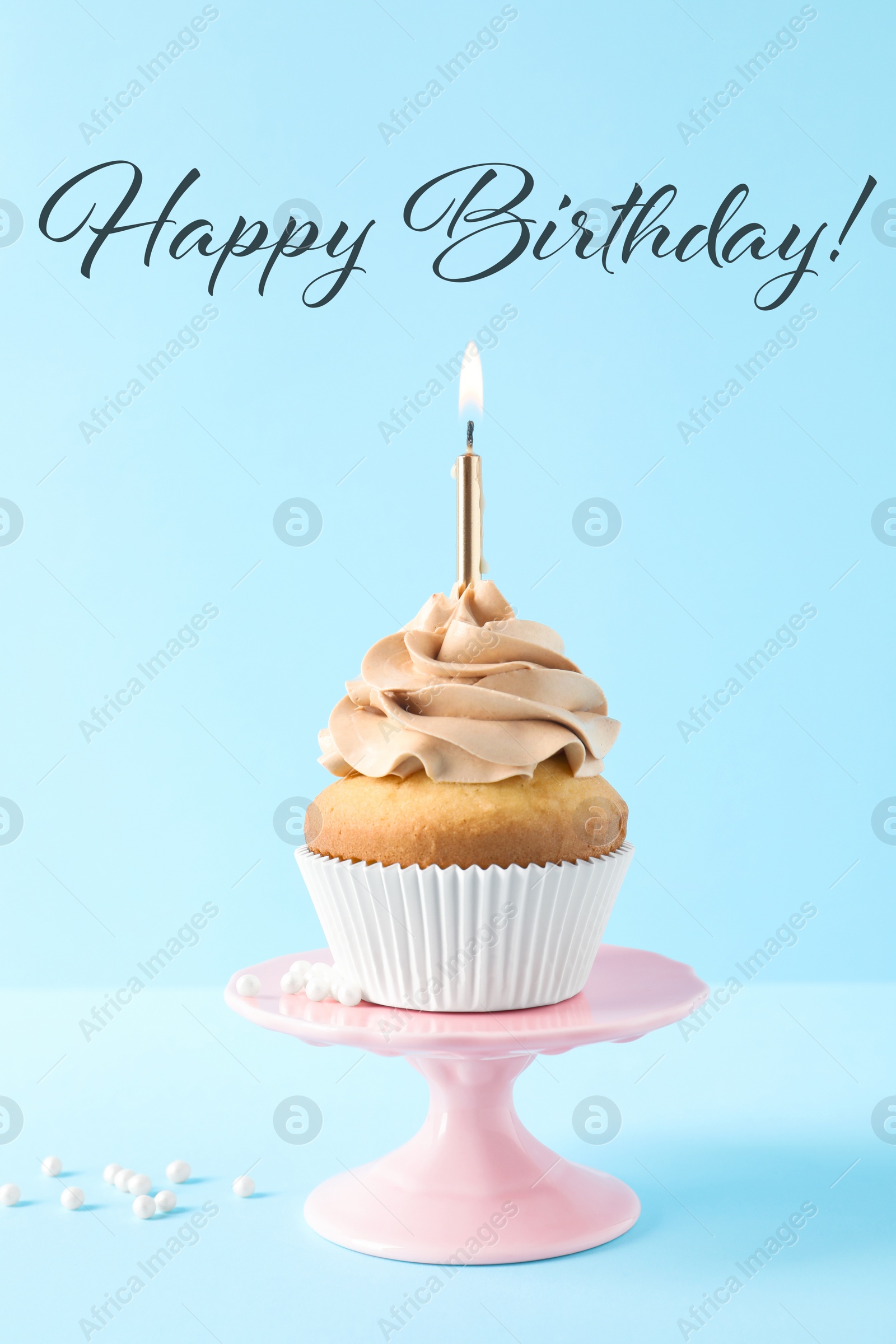 Image of Happy Birthday! Dessert stand with delicious cupcake on light blue background