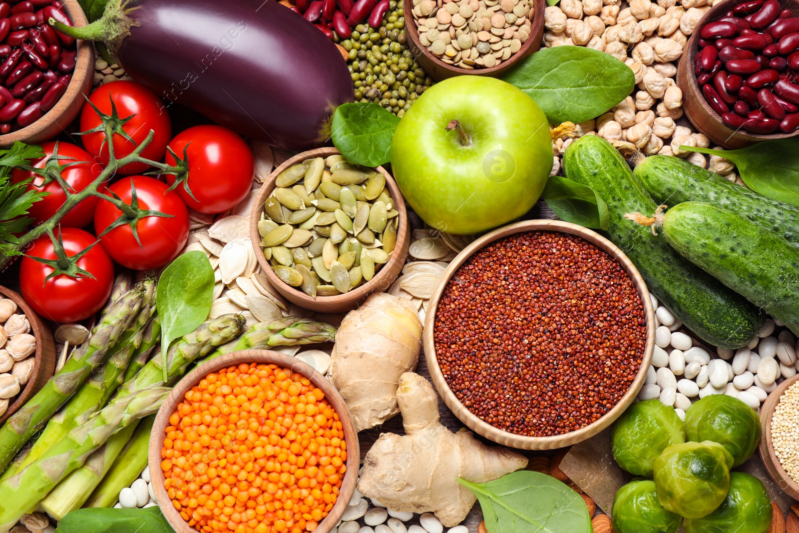 Photo of Different vegetables, seeds and fruits as background, closeup. Healthy diet