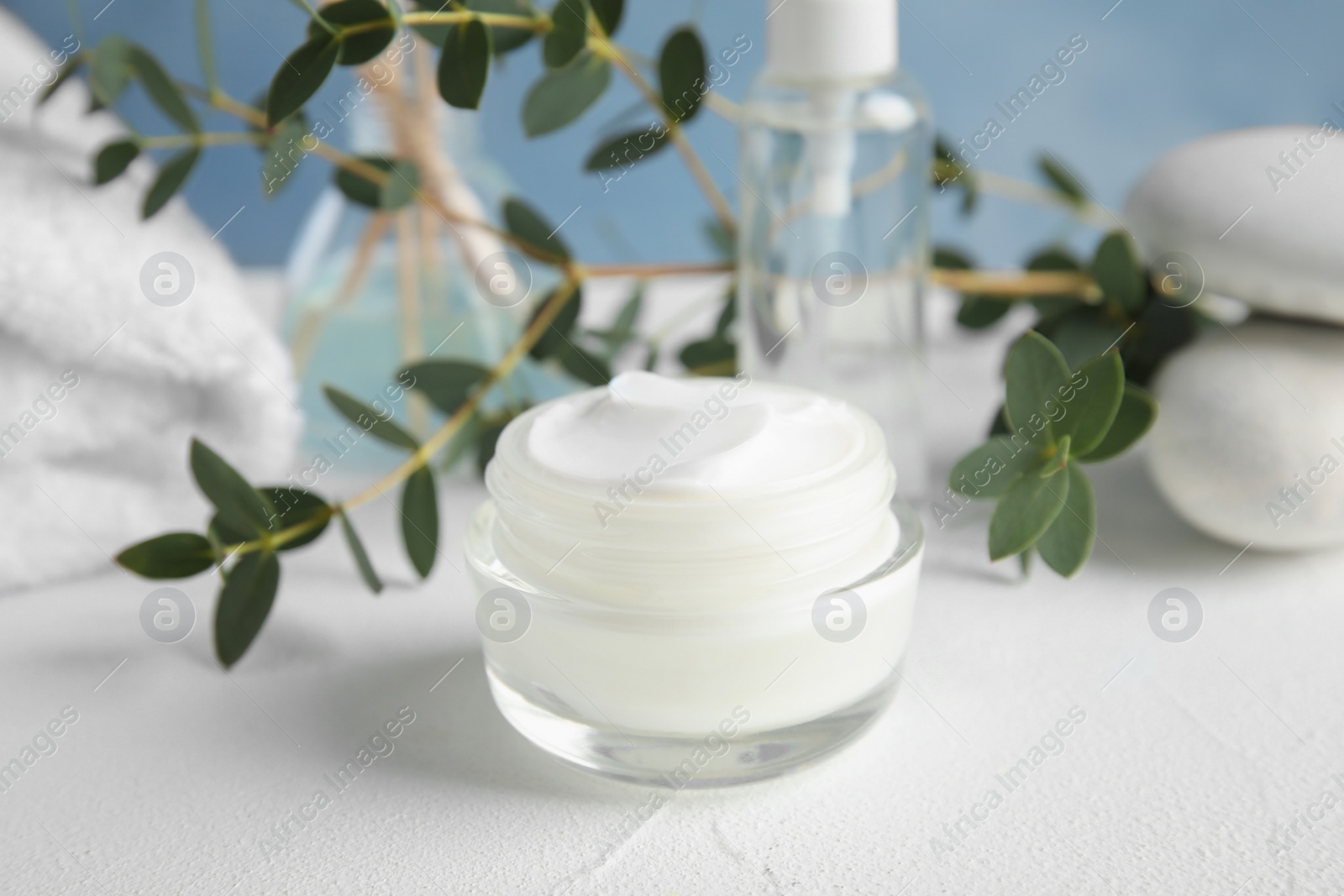 Photo of Jar of body care product on table