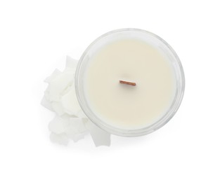 Photo of Aromatic soy candle with wooden wick isolated on white, top view