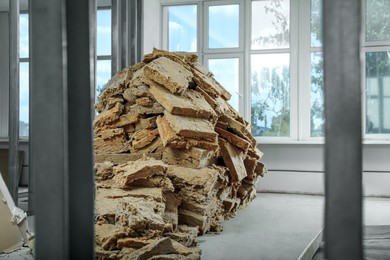 Photo of Heap of thermal insulation material in room