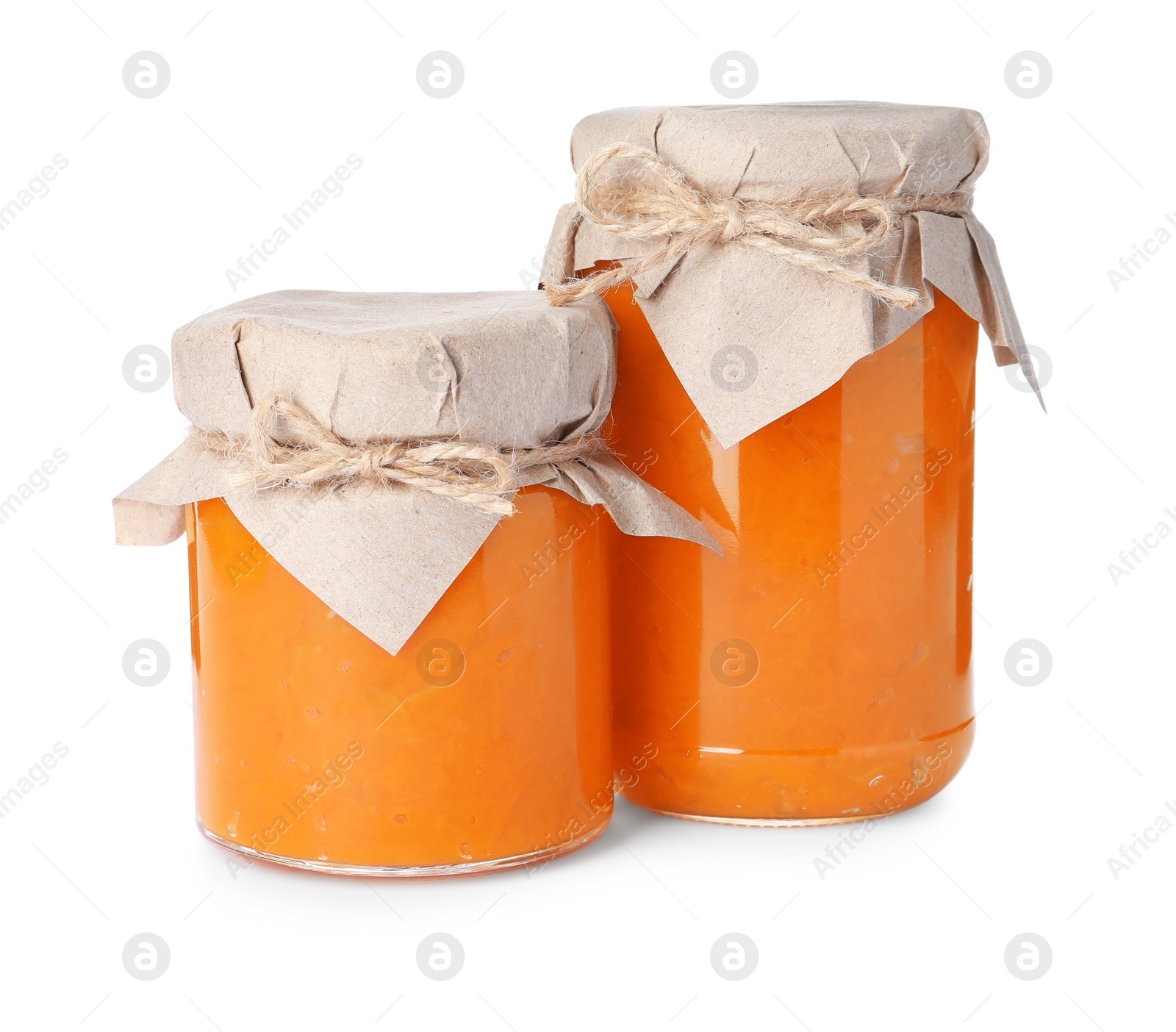 Photo of Jars of delicious pumpkin jam isolated on white