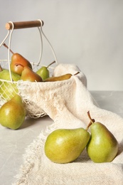 Photo of Composition with tasty ripe pears on table