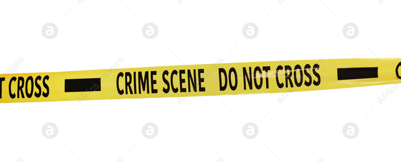 Photo of Yellow crime scene tape isolated on white