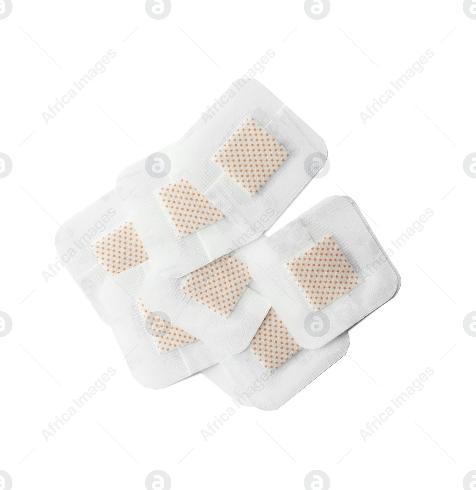 Medical sticking plasters isolated on white. First aid item Photo of Medical sticking plasters isolated on white. First aid item