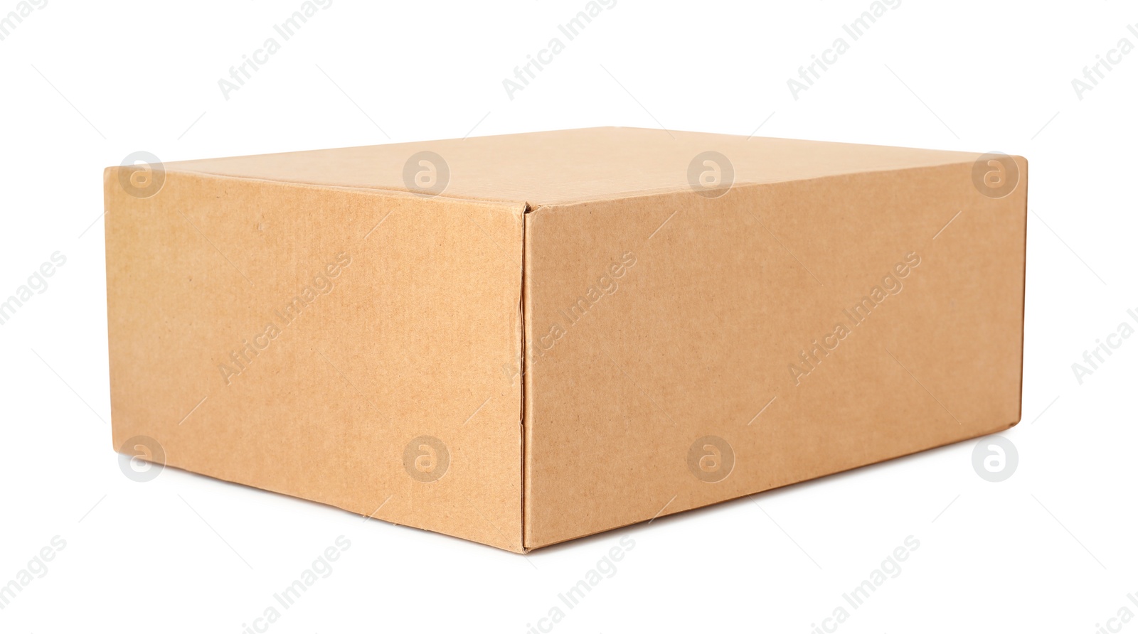 Photo of One closed cardboard box isolated on white