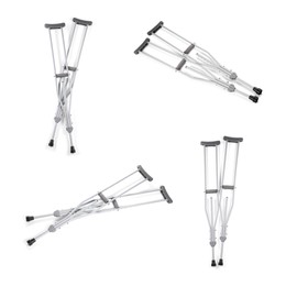 Set with axillary crutches on white background