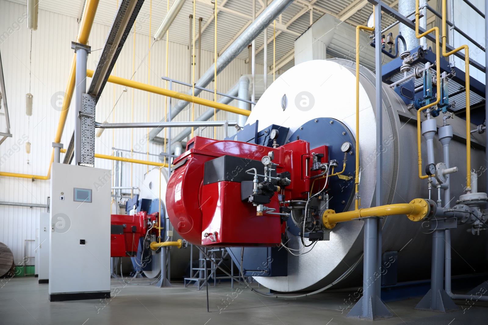 Photo of Modern granary with different equipment, inside view