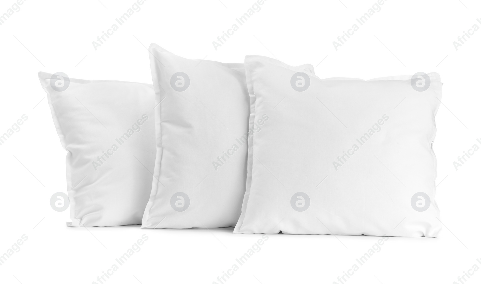 Photo of Many new soft pillows isolated on white