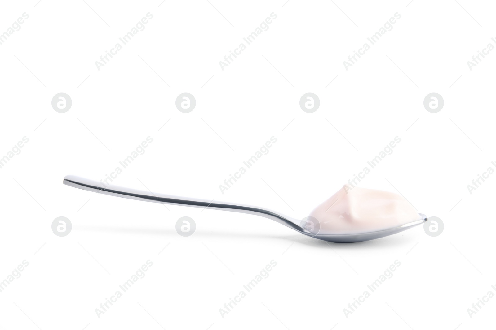 Photo of Spoon with tasty organic yogurt isolated on white