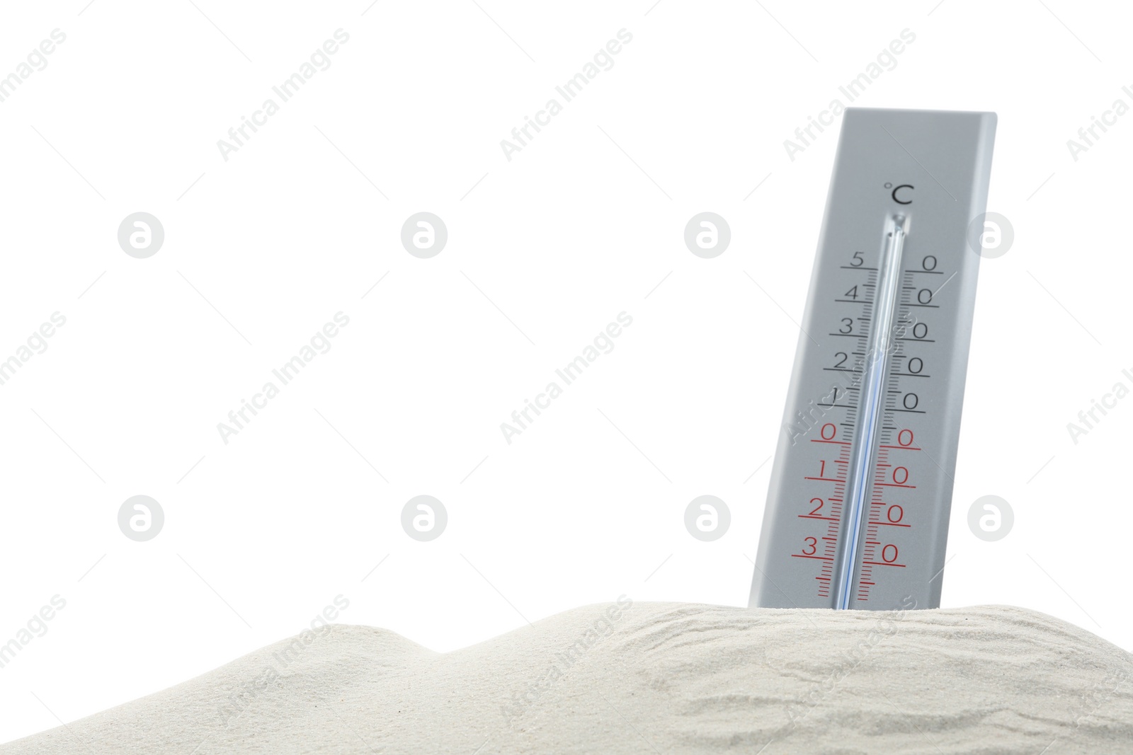 Photo of Weather thermometer in sand against white background