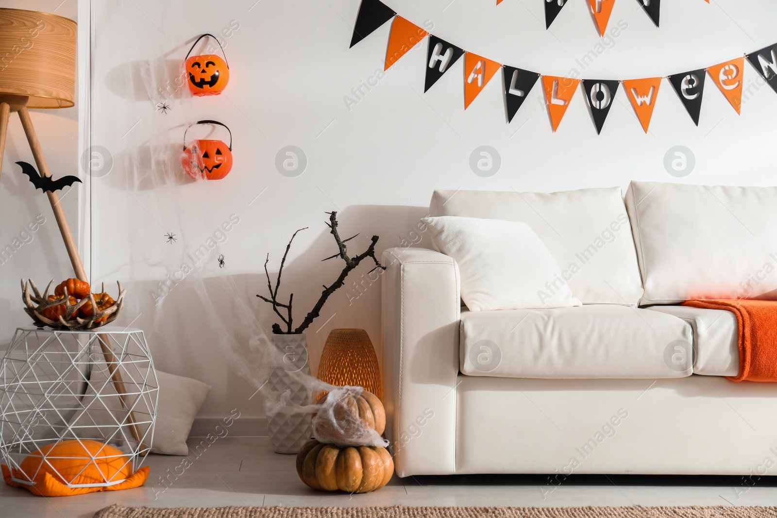 Photo of Modern room decorated for Halloween. Festive interior