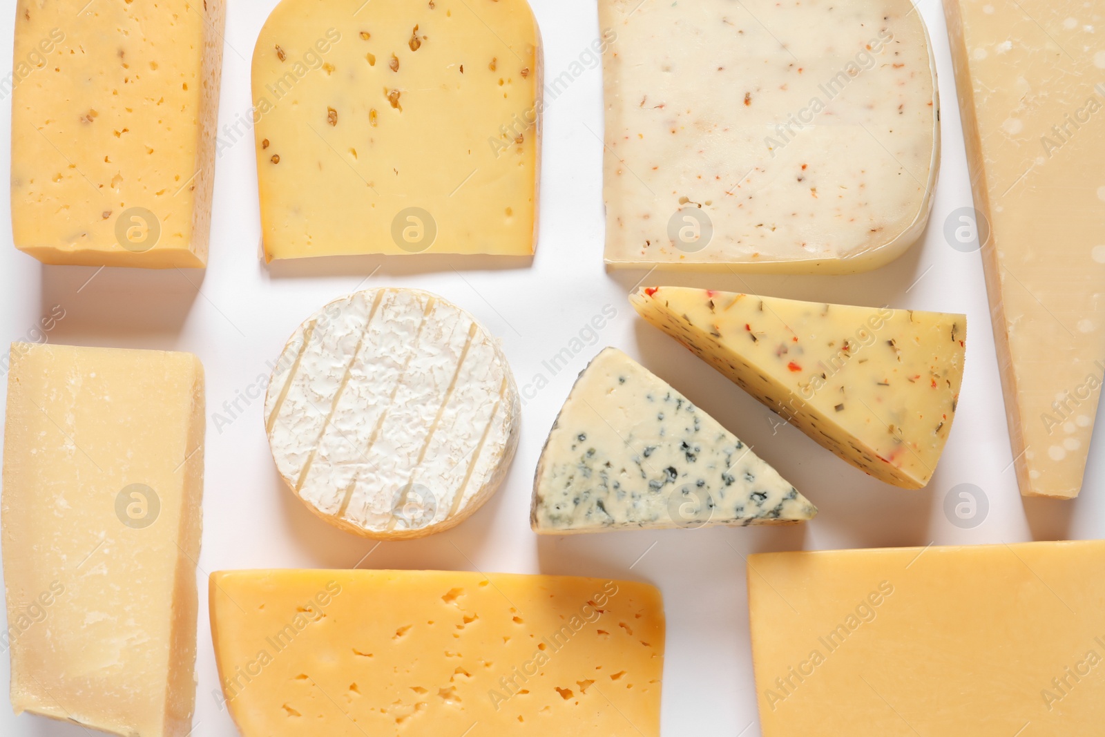 Photo of Composition with different kinds of tasty cheese on white background, top view