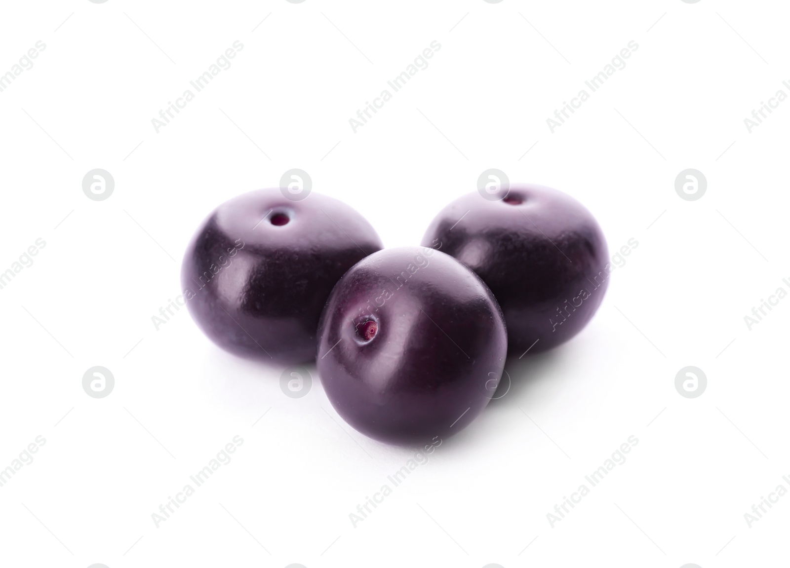 Photo of Fresh ripe acai berries isolated on white