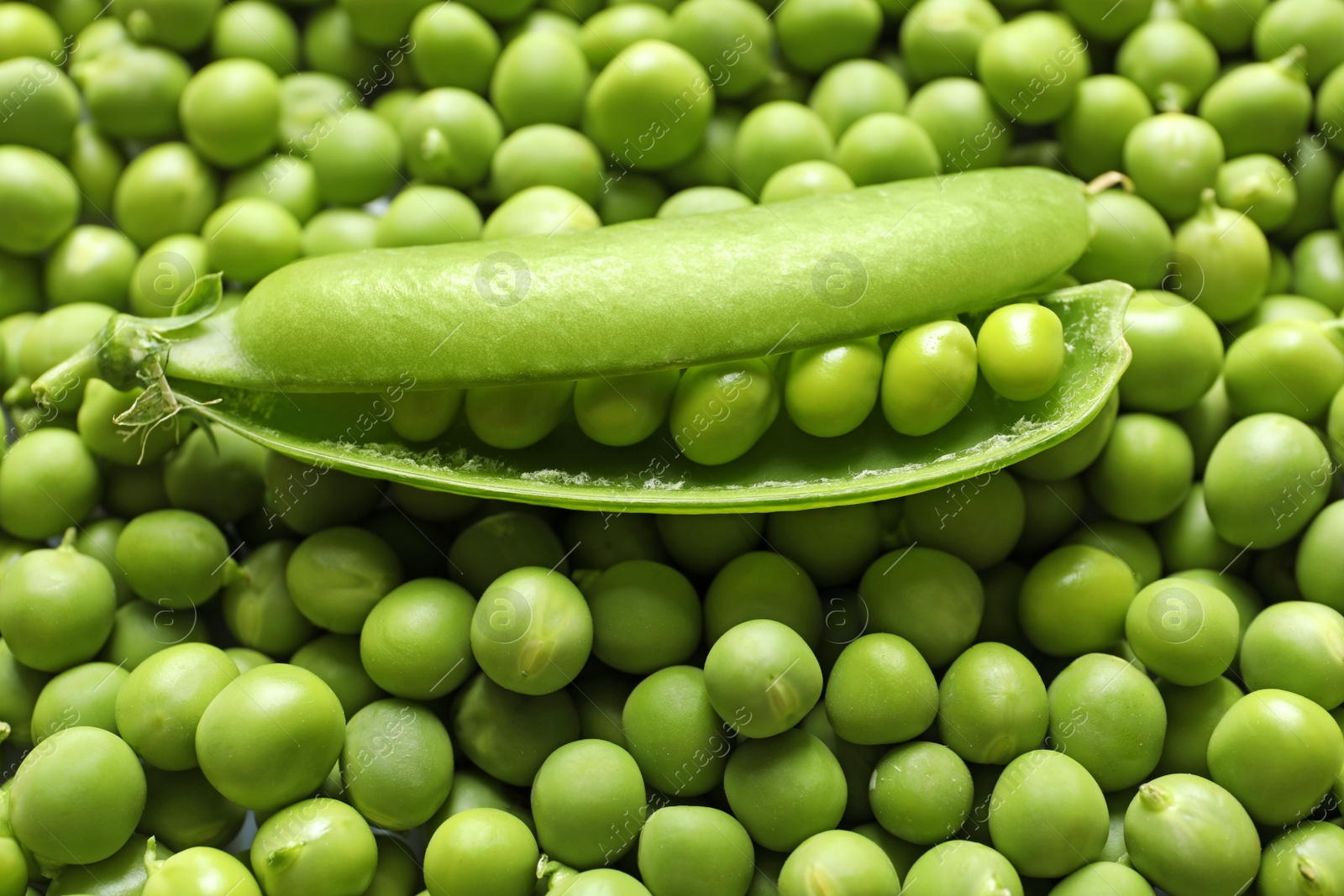 Photo of Many fresh green peas as background, closeup