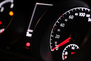 Photo of Closeup view of dashboard with speedometer in modern car