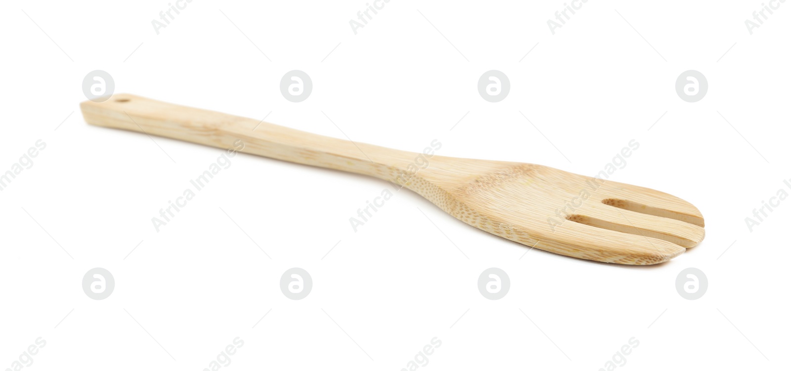 Photo of Wooden fork isolated on white. Cooking utensil