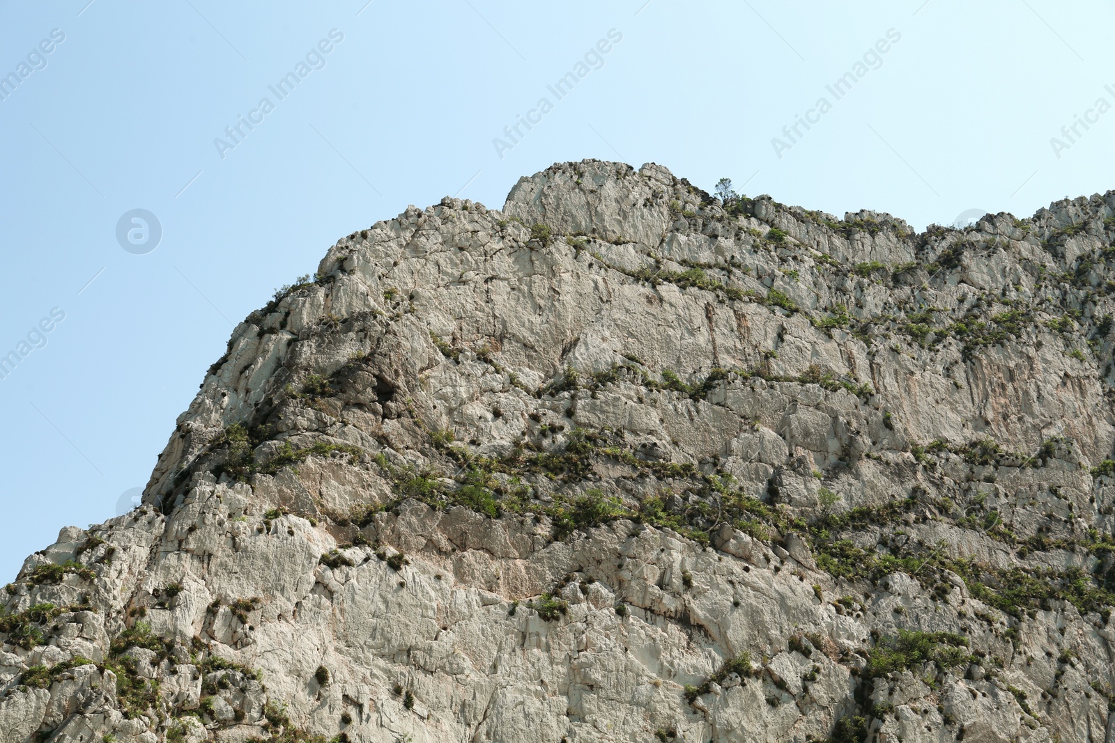 Photo of Picturesque landscape with high mountains under blue sky outdoors