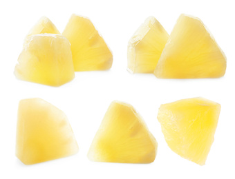 Image of Set of canned pineapple pieces on white background