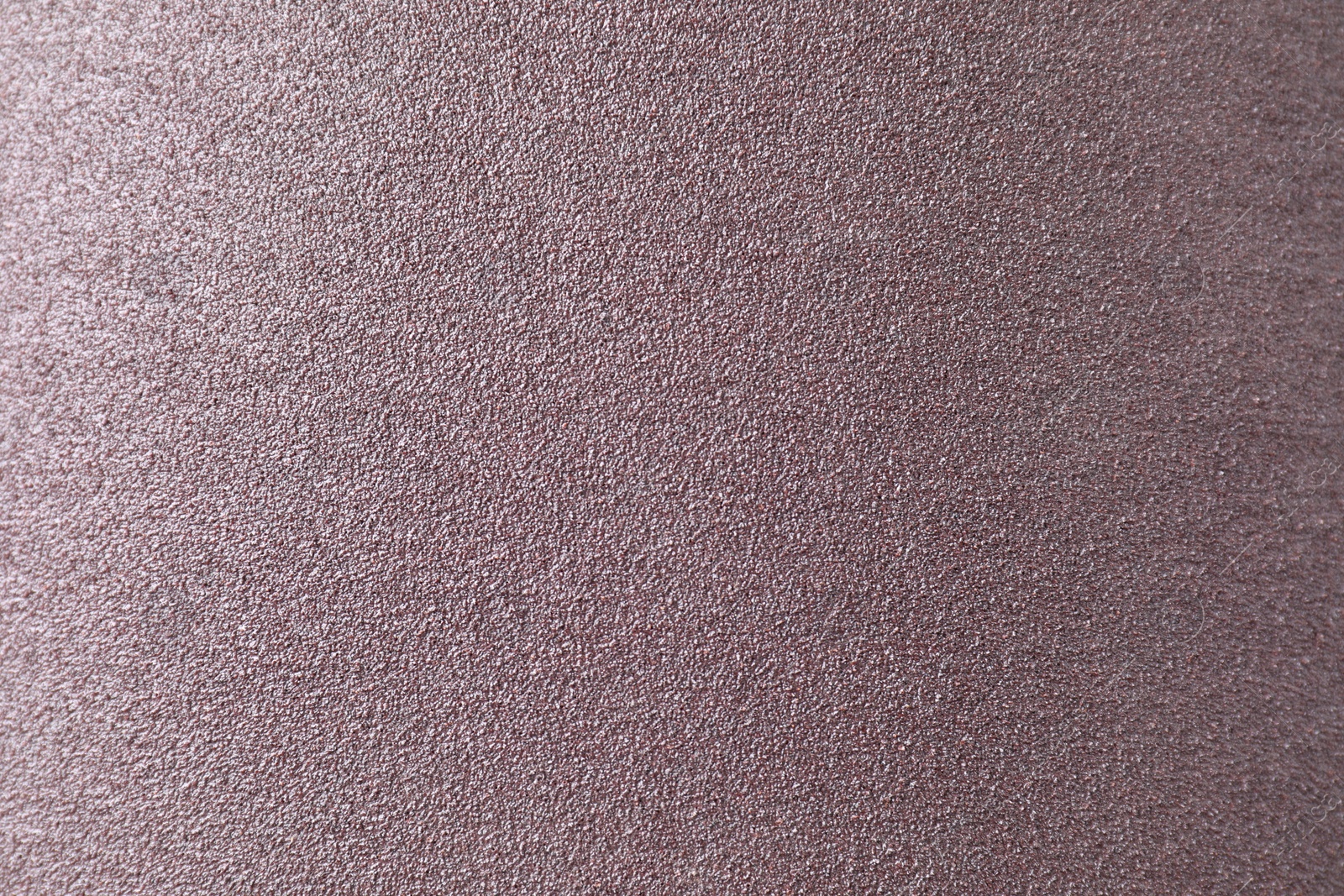 Photo of Texture of coarse sandpaper as background, top view