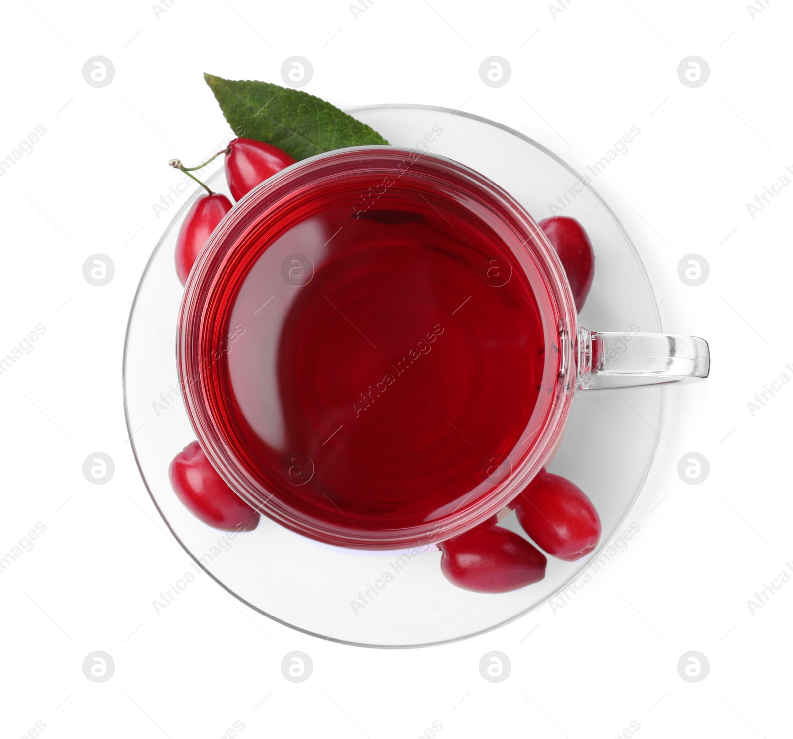 Photo of Glass cup of fresh dogwood tea, berries and leaf on white background, top view