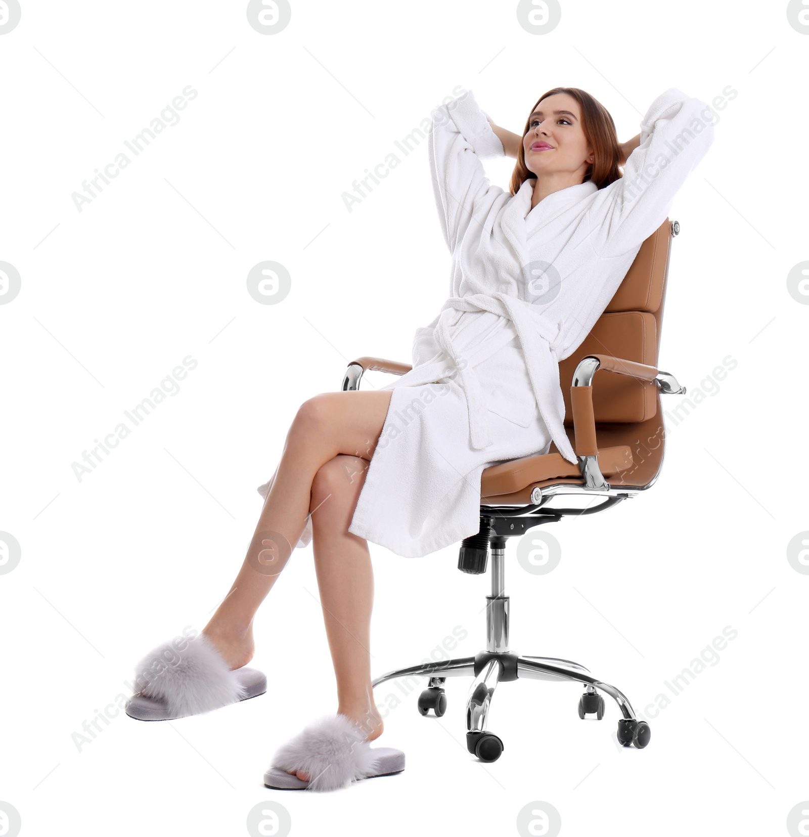 Photo of Young woman in bathrobe on white background