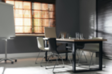 Image of Blurred view of modern office interior 