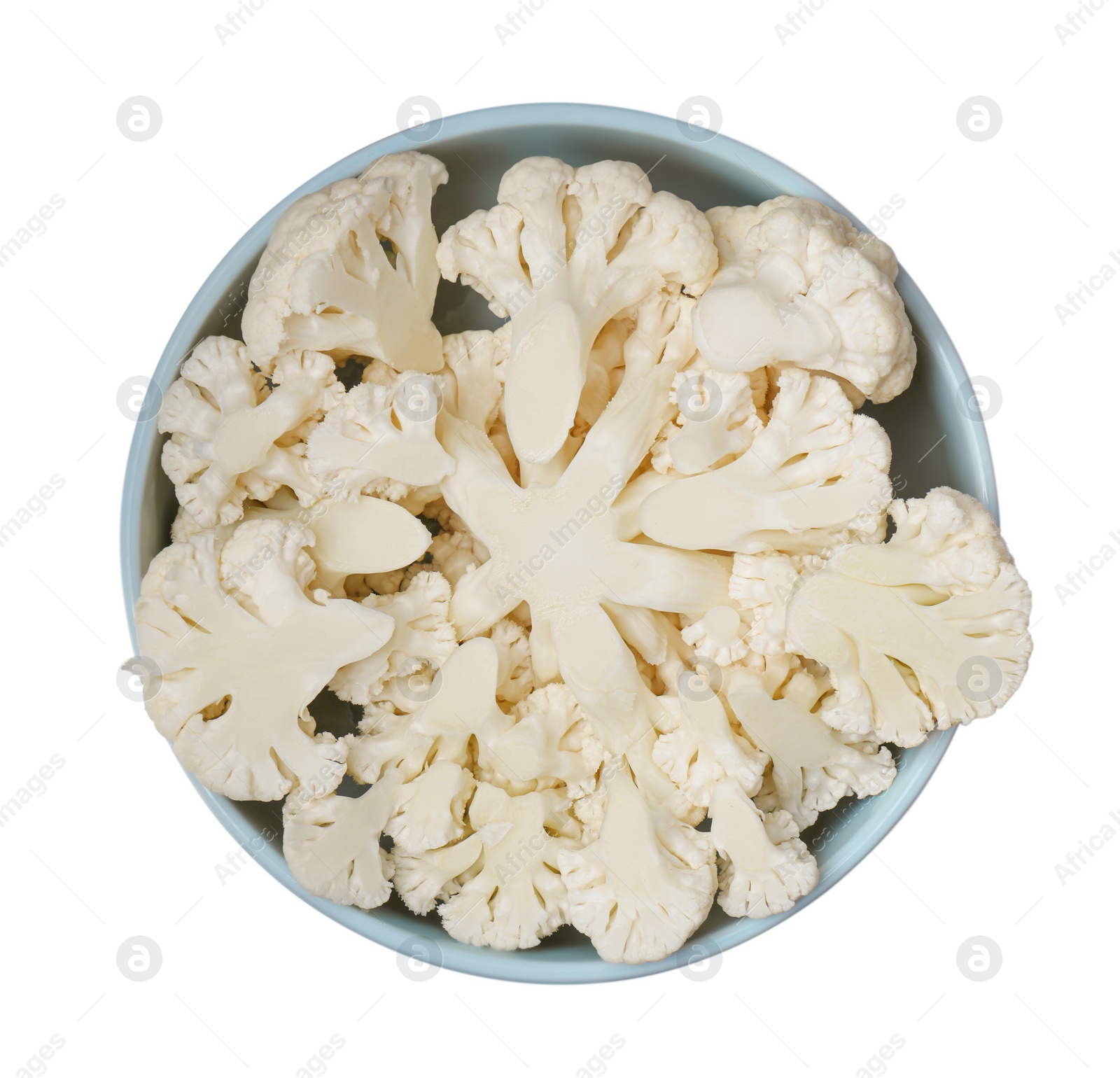 Photo of Bowl with cut fresh raw cauliflowers on white background, top view