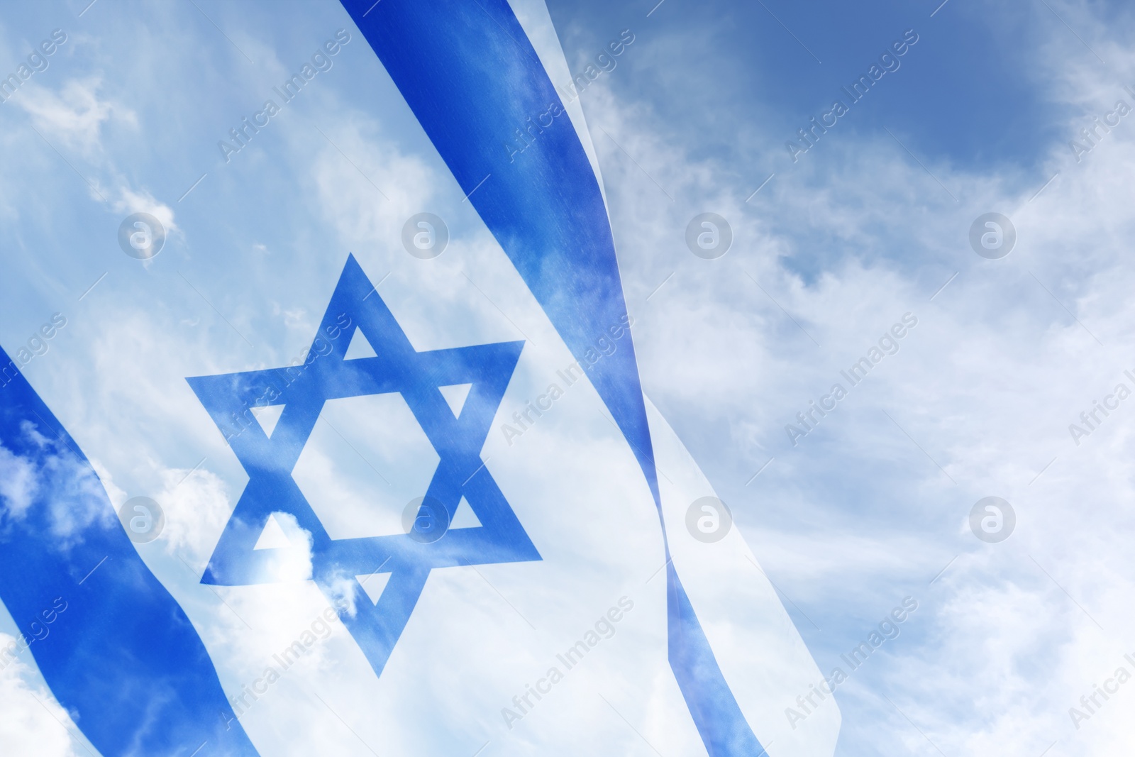 Image of National flag of Israel and blue sky with clouds, double exposure