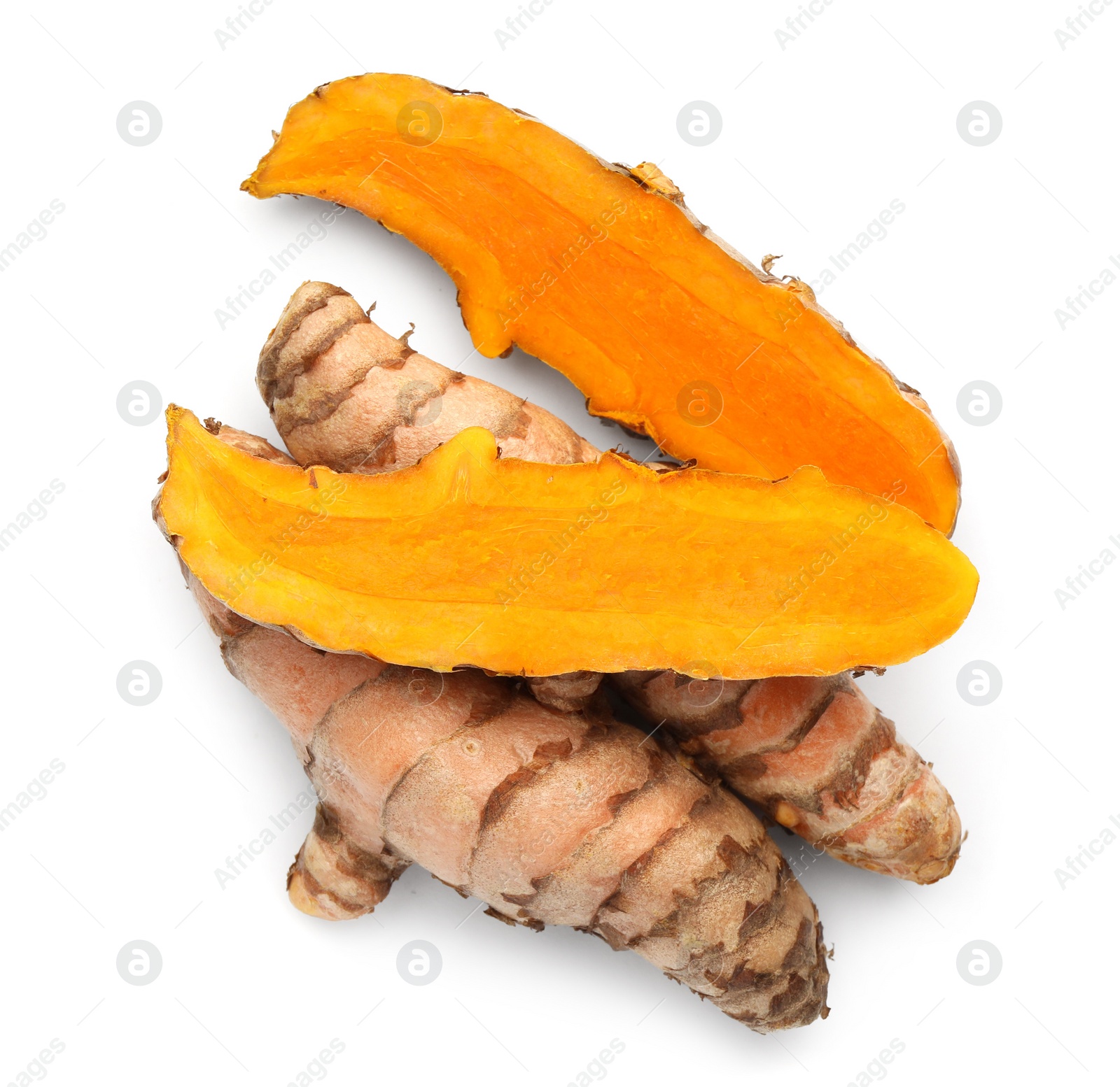 Photo of Fresh turmeric roots isolated on white, top view