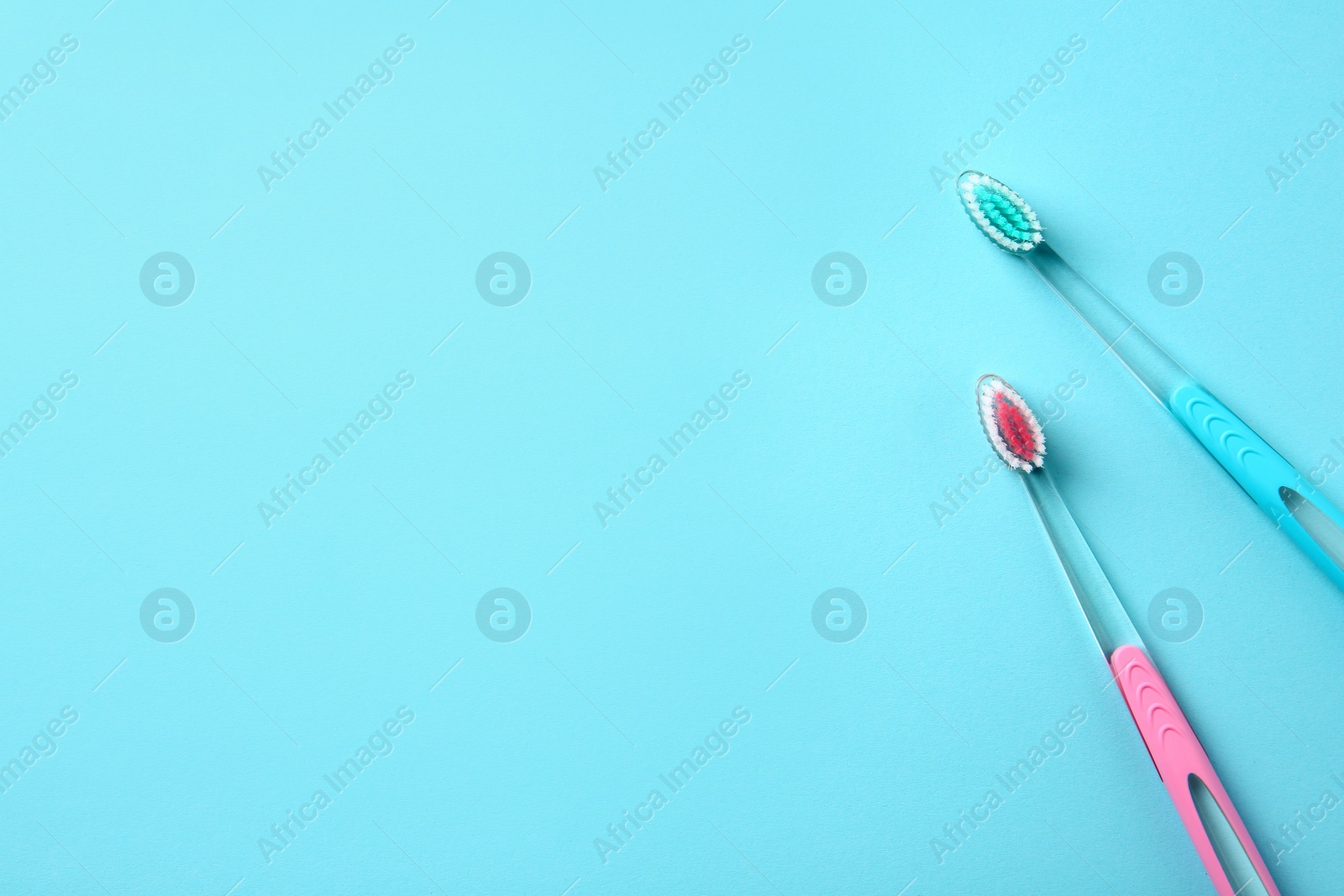 Photo of Manual toothbrushes on color background. Dental care