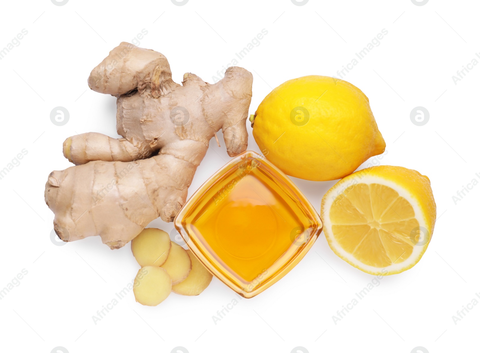 Photo of Natural cough remedies. Bowl with honey, ginger and lemon on white background, top view