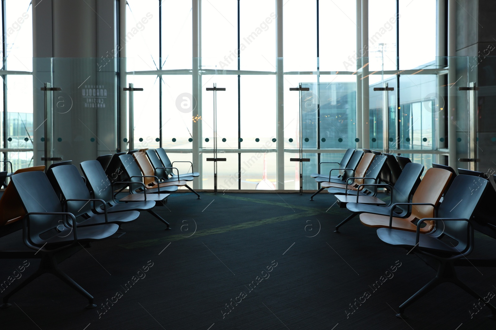 Photo of ISTANBUL, TURKEY - AUGUST 13, 2019: Waiting area with seats in new airport terminal