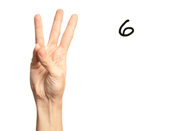 Image of Woman showing number six on white background, closeup. Sign language