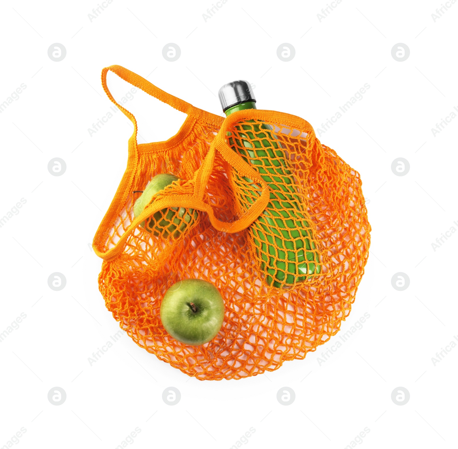 Photo of Mesh bag with different items isolated on white, top view. Conscious consumption