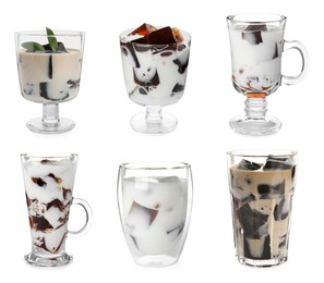 Image of Glasses of milk with tasty grass jelly on white background