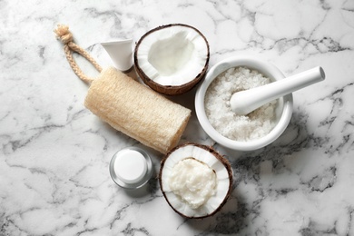 Photo of Composition with handmade natural body scrub in nut on light background