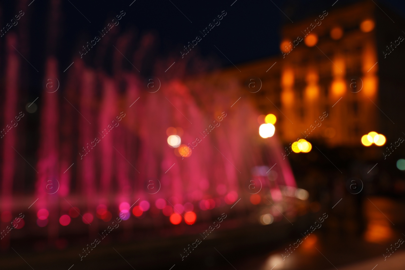 Photo of Blurred view of beautiful city at night. Bokeh effect