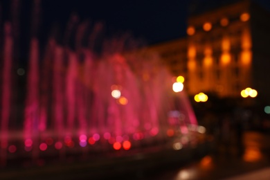 Photo of Blurred view of beautiful city at night. Bokeh effect