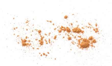 Dry aromatic cinnamon powder isolated on white, top view