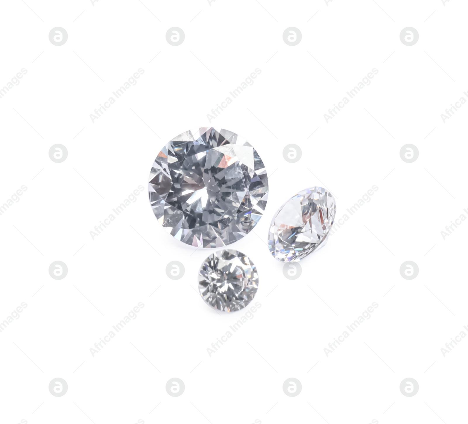 Photo of Different beautiful shiny diamonds isolated on white