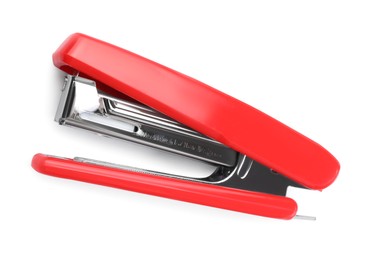 Photo of One red stapler isolated on white, top view