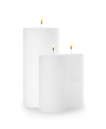 New candles with wicks isolated on white