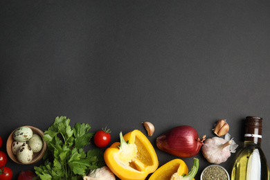 Photo of Flat lay composition with ingredients for cooking on black background. Space for text