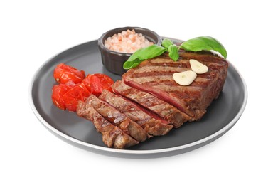 Photo of Delicious grilled beef steak with spices and tomatoes isolated on white