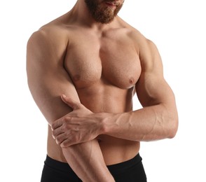 Man with muscular body on white background, closeup