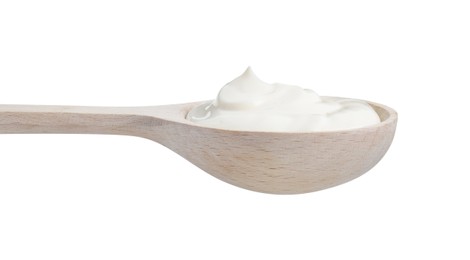 Photo of One wooden spoon with mayonnaise isolated on white