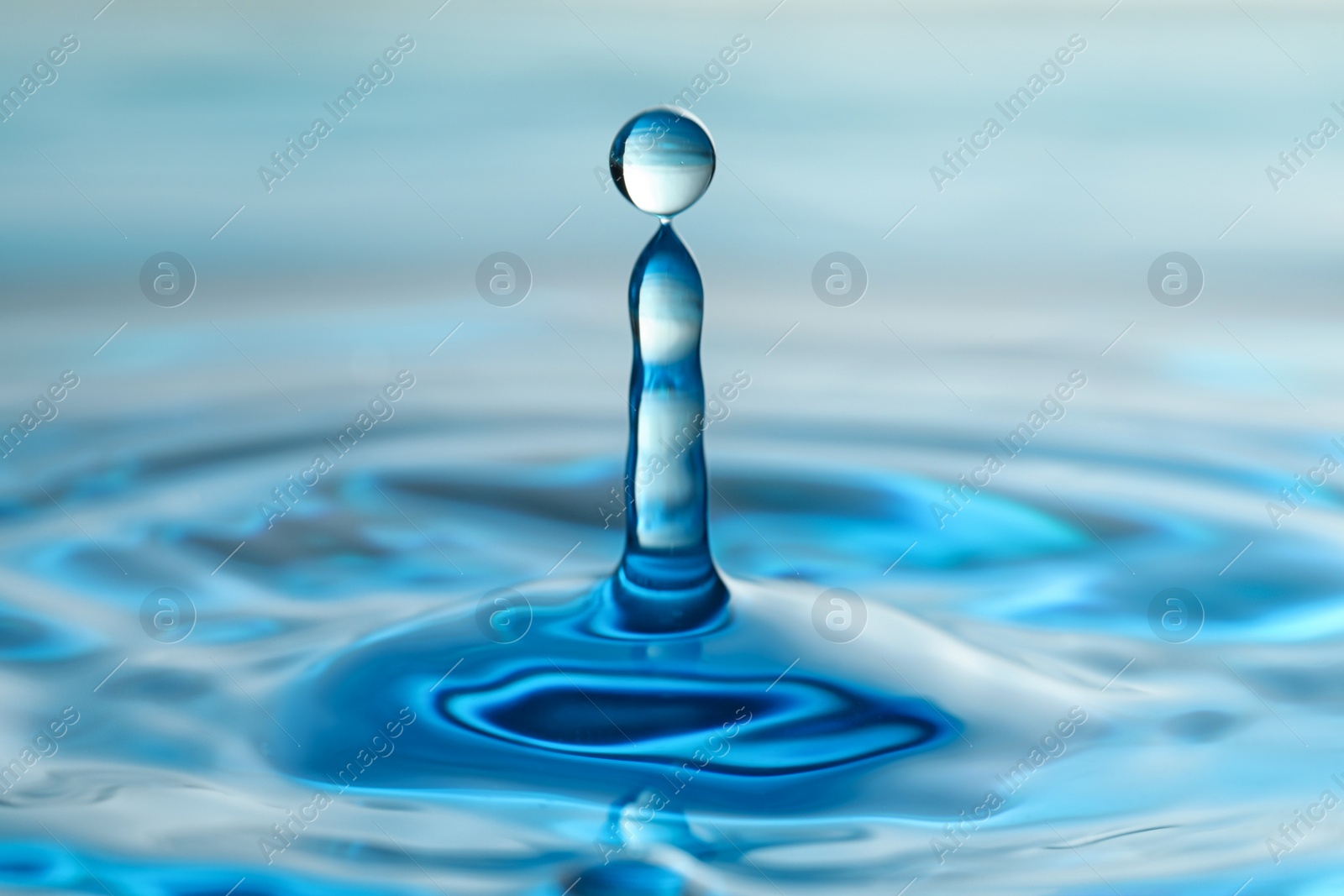 Photo of Splash of clear water with drops as background, closeup