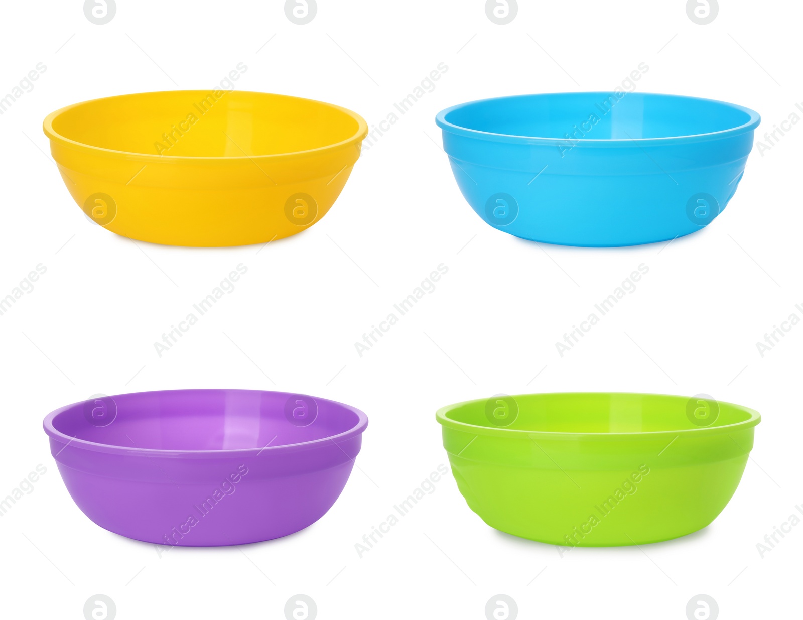 Image of Set with colorful bowls on white background. Serving baby food